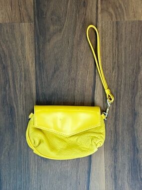 Yellow leather wristlet with faux patent leather accents